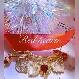 NWT Gold charm bangle bracelet with red and gold charms